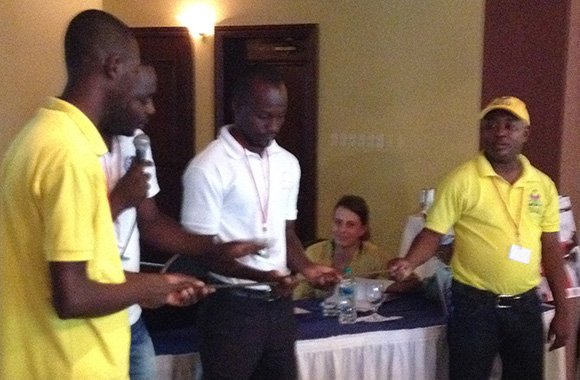 Fig. 5: Haitian Ministry of Public Works (MTPTC) engineers demonstrate earthquake-resistant construction techniques at the Understanding Risk Haiti conference, 2014. Photo by the author.