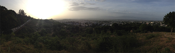 Fig. 1: Site of the former Petionville Club Camp. At its height, the camp was home to 55,000 internally displaced persons. Since being cleared in 2014 through the relocation of families by J/P Haitian Relief Organization (J/P HRO), it currently offers a sublime view of the sun sinking into the Gulf of Gonâve. Photo by the author.